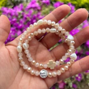 Rosario pulsera de San José color rosado claro