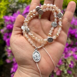 Rosario pulsera de San José color rosado claro